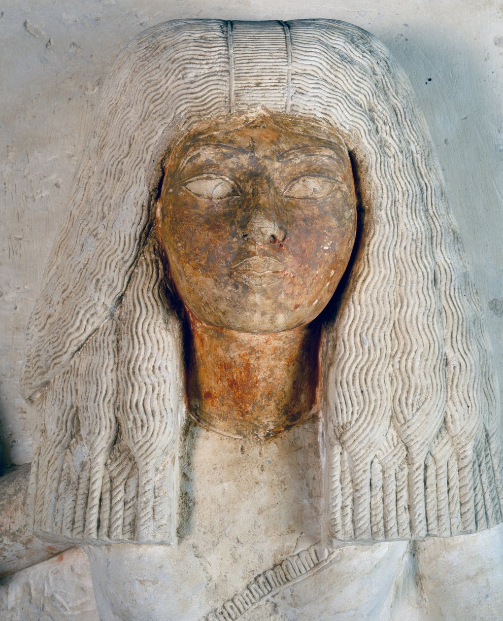 Aniuias ansikt, skriver Meryneiths kone, detalj fra dobbel statue av yppersteprest Meryneith og hans kone Aniuia, malt kalkstein som dateres fra regjeringen til Akhenaten, Saqqara. Egyptisk sivilisasjon, New Kingdom, Dynasti XVIII. av Egyptian 18th Dynasty