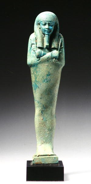 Ushabti-figur for Nakht-Hor-em-heb-mes-em-khereden, sen dynastisk periode, ca. 600 f.Kr. (fajanse) (se også 241440) av Egyptian 26th Dynasty