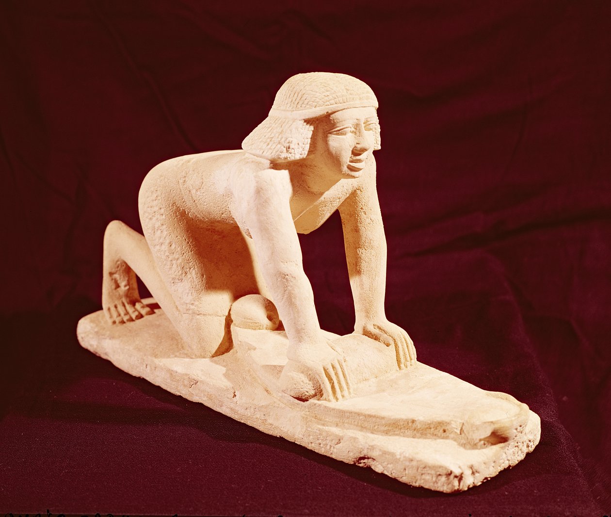 Modell av en tjener som maler korn, Old Kingdom, fra Saqqara av Egyptian 5th Dynasty