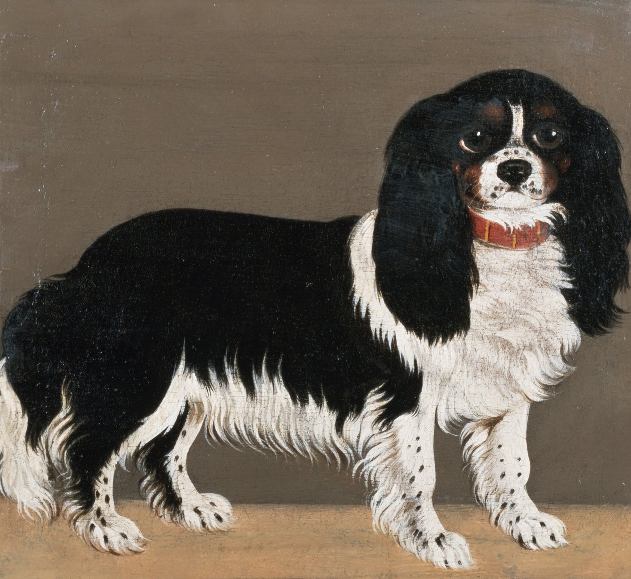 En Cavalier King Charles Spaniel (par 64045) av English School