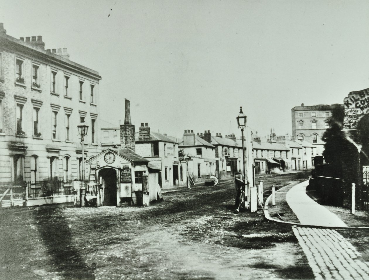 Kilburn Toll Gate i sørenden av Kilburn High Road ved veikrysset til Kilburn Priory, Camden Libraries, 1875 av English Photographer