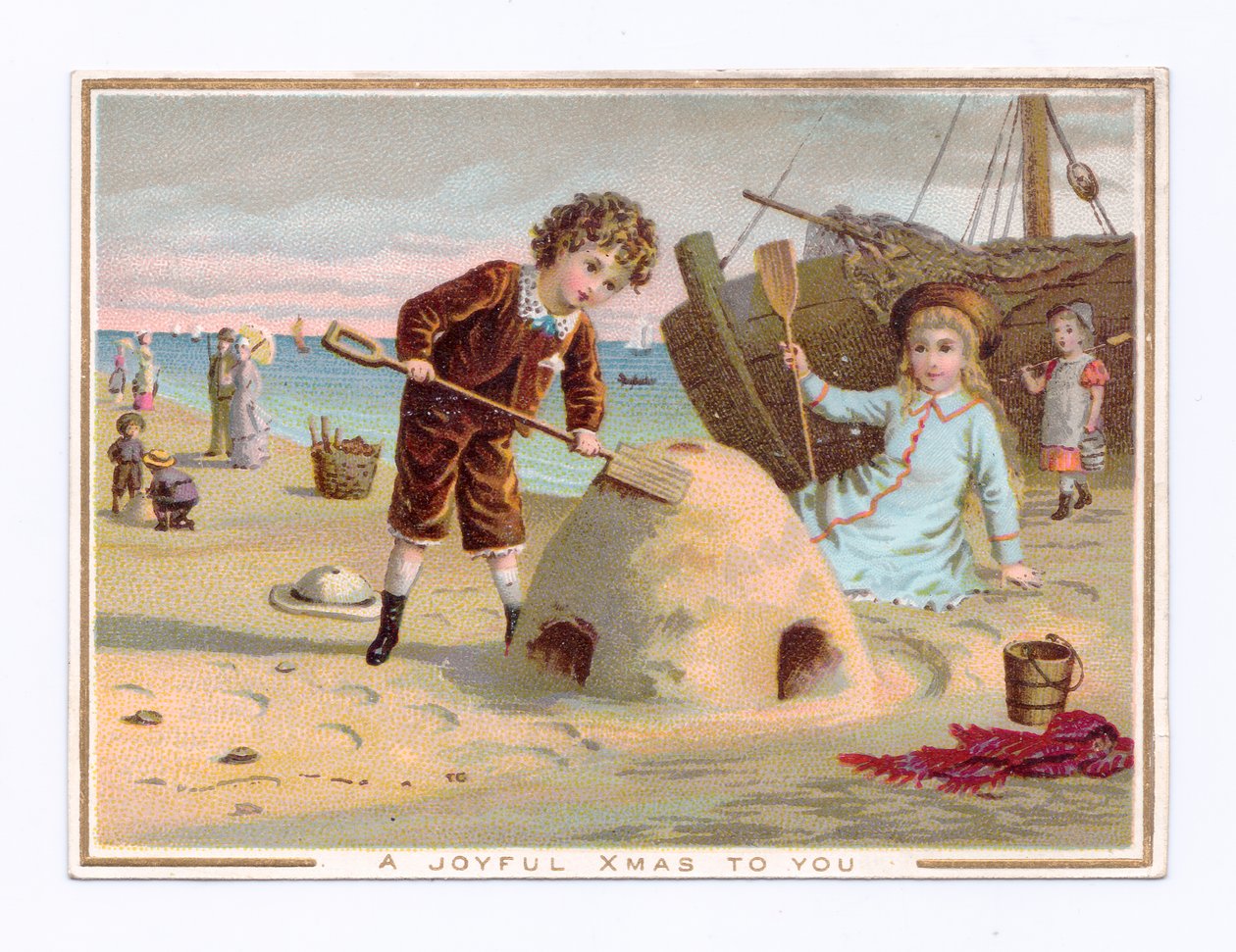 Et viktoriansk julekort av en gutt som bygger et sandslott på en strand, ca. 1880 (farge litho) av English School