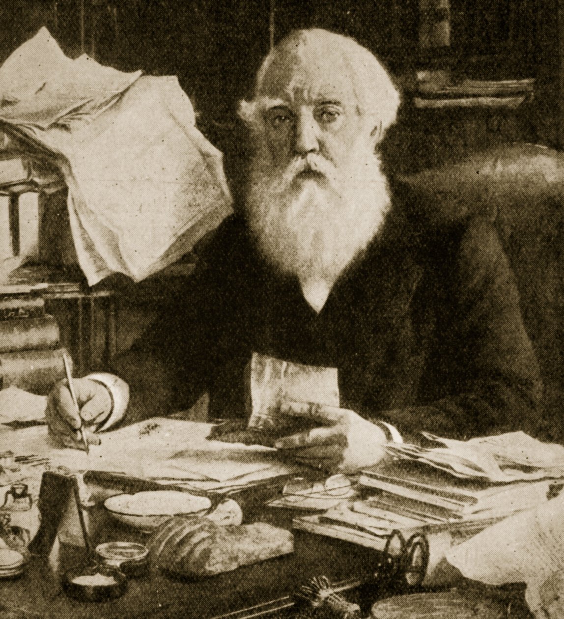 Austen Henry Layard sitter ved skrivebordet sitt av English School