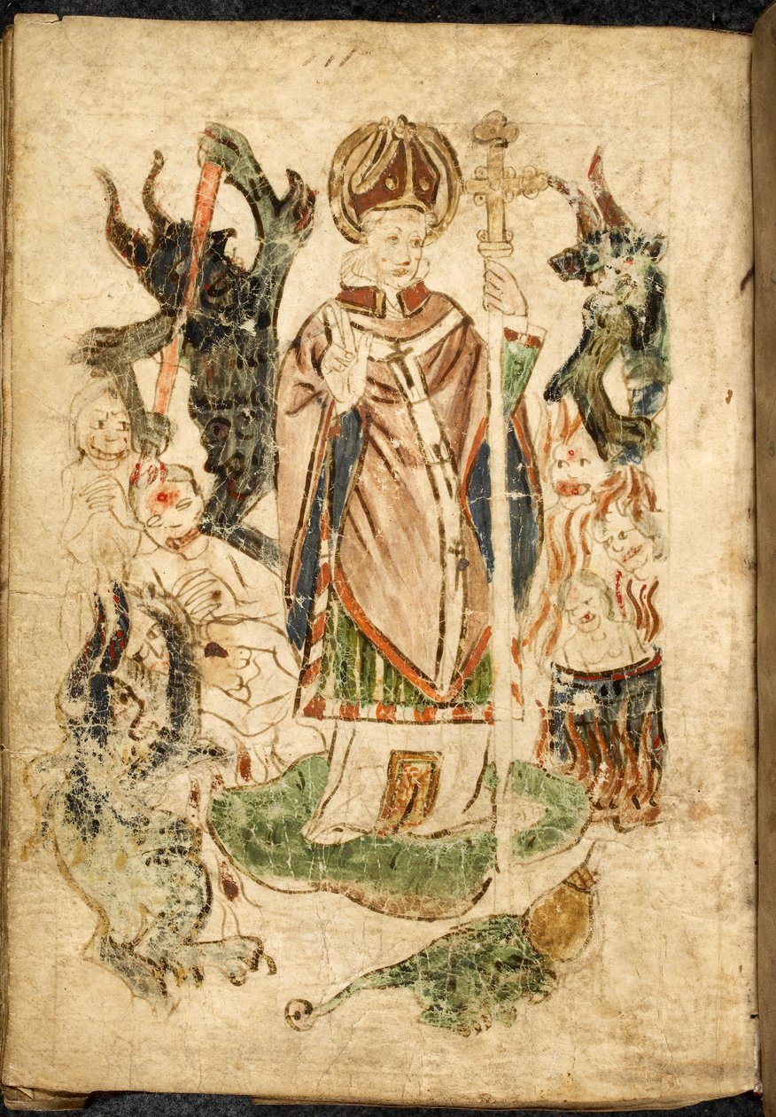 Saint Patrick, i biskopsdrakt, holder et krusifiks og gjør en velsignelsesgest, står på øya Lough Derg, Donegal (Irland), omgitt av demoner og plagede sjeler. Bilde tatt fra ""Purgatory of Saint Patrick"", engelsk manuskript, m av English School