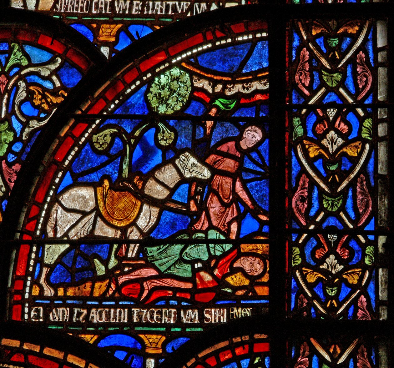 Windows 7 som viser en scene fra et St Thomas Becket Miracle-vindu: William av Gloucester er begravet, men stemmen hans blir hørt av English School