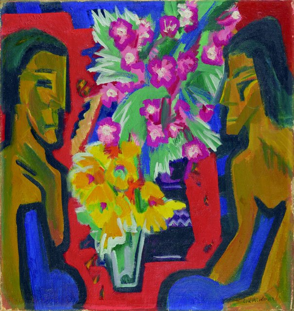 Stilleben med to trefigurer og blomster av Ernst Ludwig Kirchner