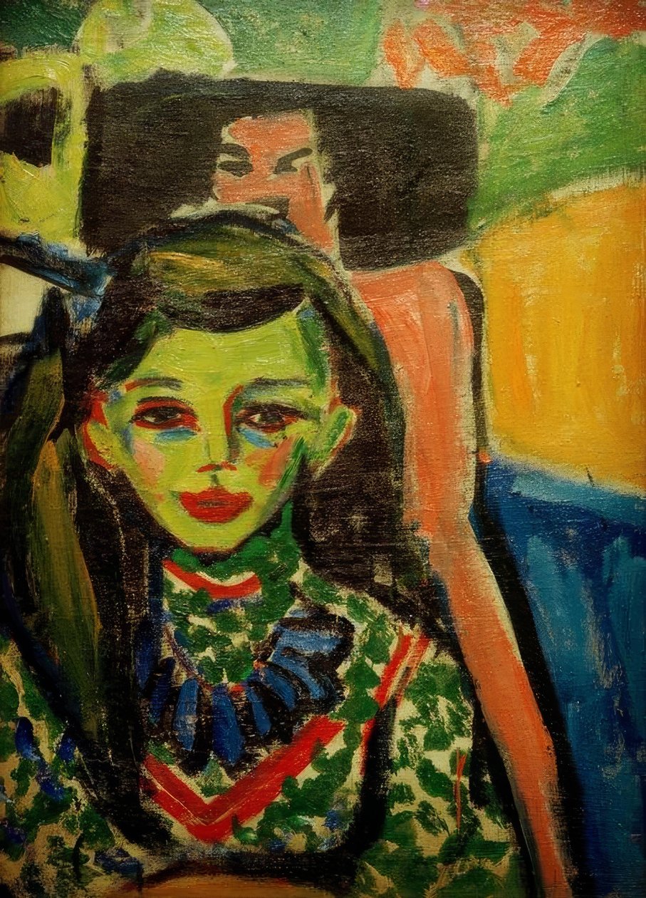 Fränzi foran en utskåret stol av Ernst Ludwig Kirchner