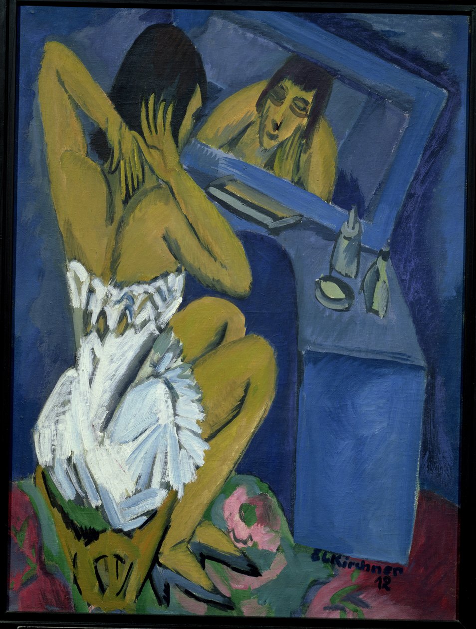 Kvinne foran speilet av Ernst Ludwig Kirchner