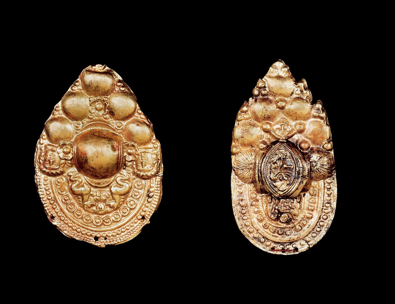 Etruskiske smykker: ørering i gull. av Etruscan Etruscan