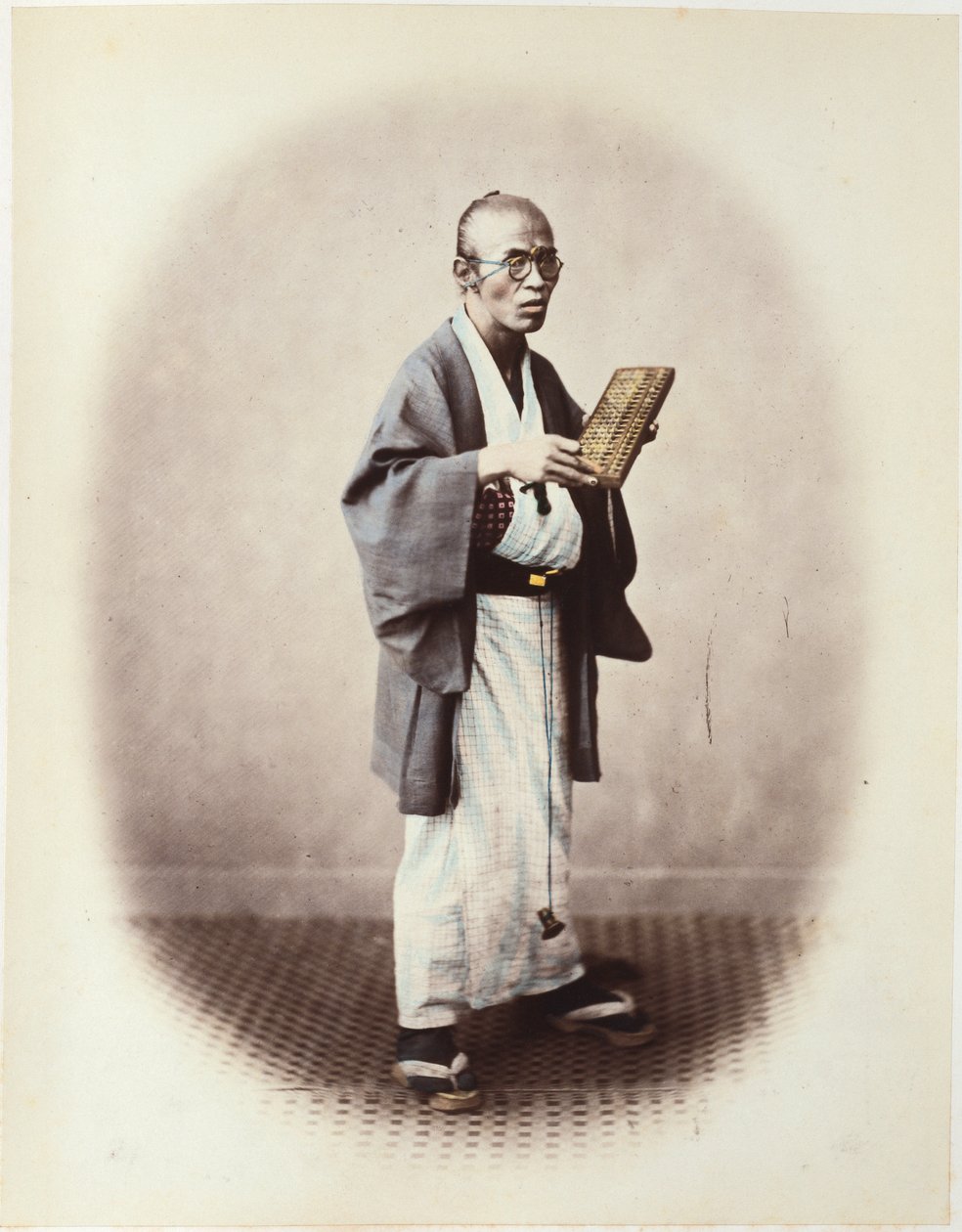 En kontorist, ca. 1868 av Felice Beato