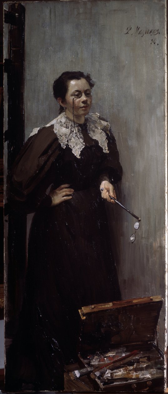 Portrett av kunstneren Anna Ostroumova Lebedeva (Ostroumova-Lebedeva) (1871-1955) (Portrett av kunstneren A. Ostroumova). Representert bak maleutstyret hennes, med kikkert på nesen og et annet par i hånden. Maleri av Filipp And av Filipp Andreevich Maliavin