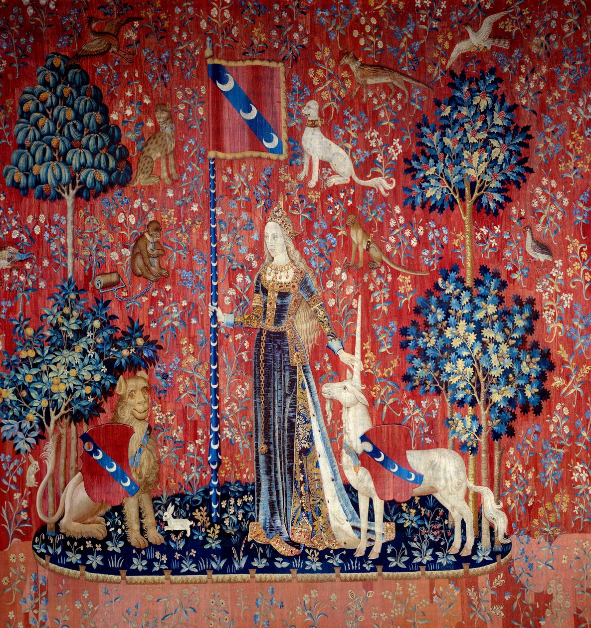 En ung kvinne omgitt av en løve, en enhjørning, en ape, kaniner) - Ull- og silketeppe laget mellom 1484 og 1500, Fra slottet Boussac, Creuse. Søn. 3,7x4,7 m - Paris, musee national du Moyen Ages, Thermes de Cluny - Allegori om berøring (Le Touch av Flemish School