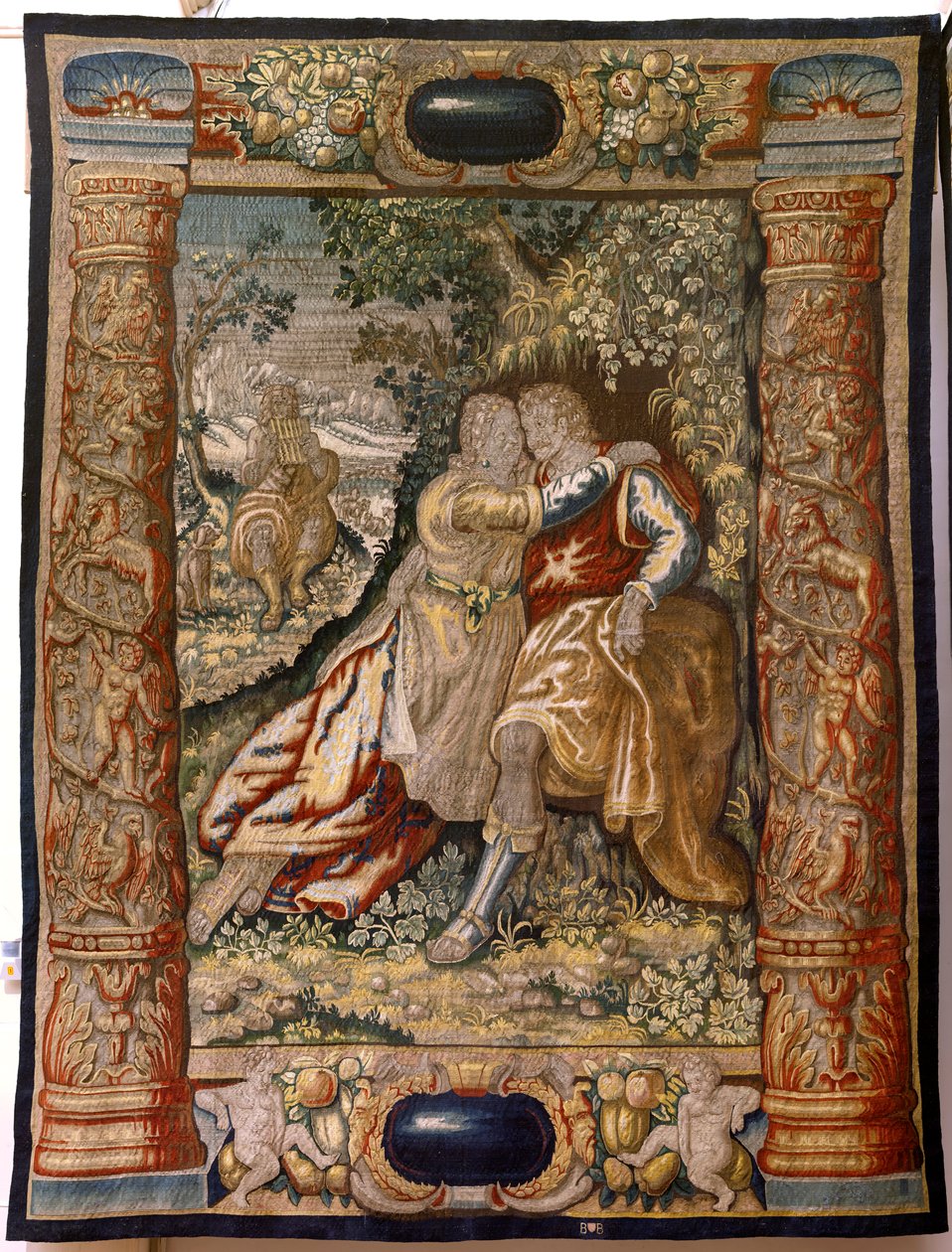 flamsk billedvev. Serie Gallantry (Galante). Par med musiker (Pareja con músico). Produserer Brussel, tidlig på 1600-tallet. Stoff Silke og ull, 5/6 varp pr cm. Størrelse 348 x 263 cm. Plassering San Millán de la Cogolla kirke, Oncala (Soria). Opprinnelse av Flemish School