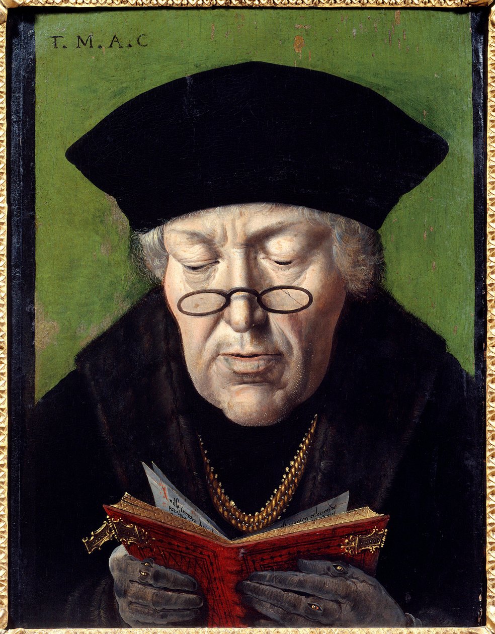 Portrett av Thomas More (1478-1535), humanist. Humanisten er representert med briller som leser en bok. Maleri av den flamske skole av Flemish School
