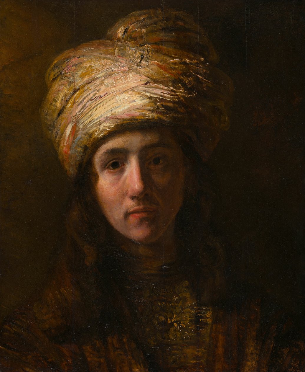 Ung mann i en turban av Follower of Rembrandt van Rijn