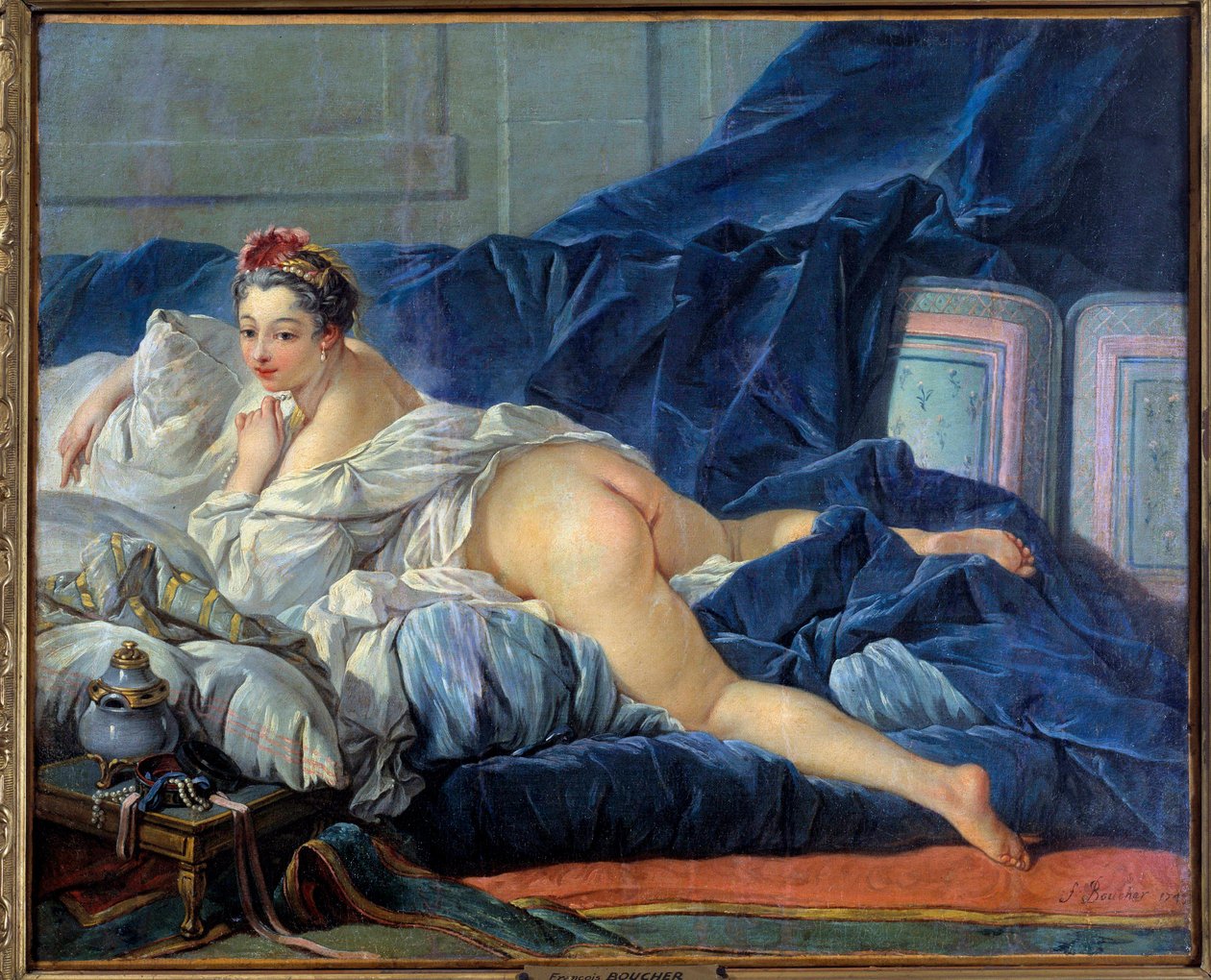 Den odaliske unge kvinnen sitter på en sofa. Maleri av Francois Boucher (1703-1770) 1752 Reims musee des Beaux Arts av François Boucher