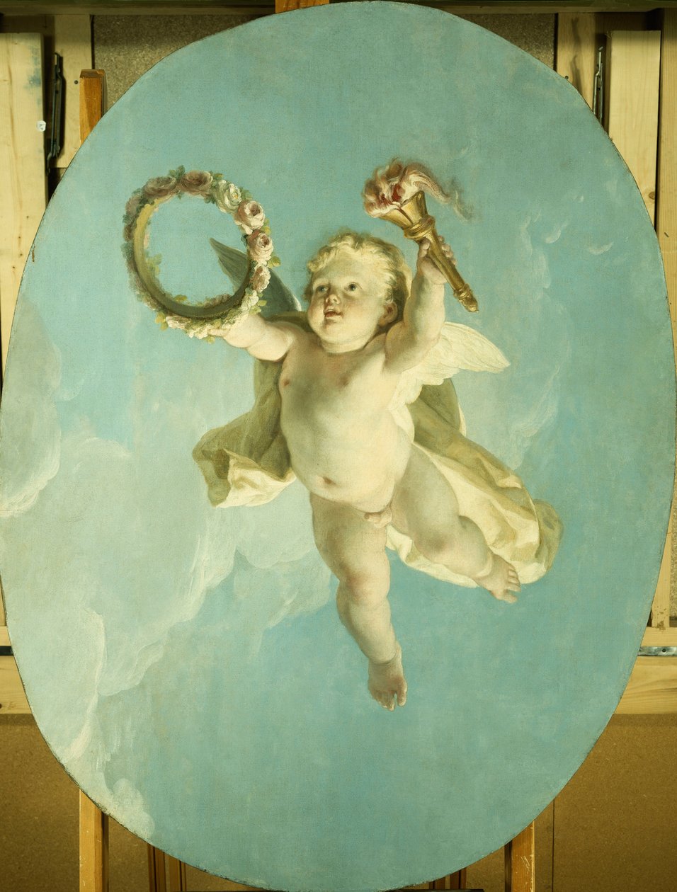 En Putti på flukt holder en krans og en fakkel, av François Boucher