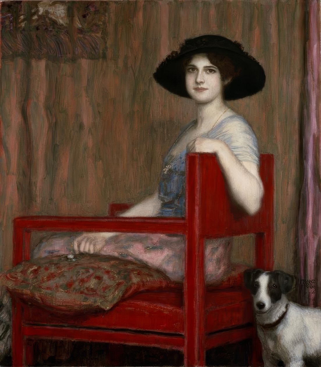 Mary von Stuck i en rød lenestol av Franz von Stuck