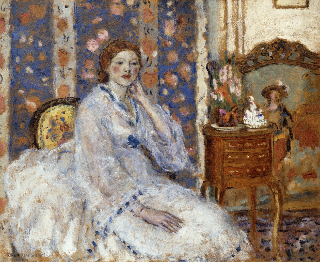 Kvinne sitter i en lenestol av Frederick Carl Frieseke