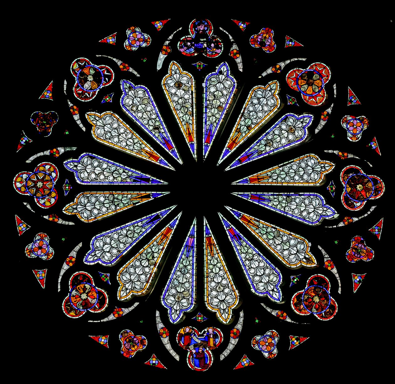 Et rosevindu fra slutten av 1200-tallet med noe originalt glass (farget glass) av French School