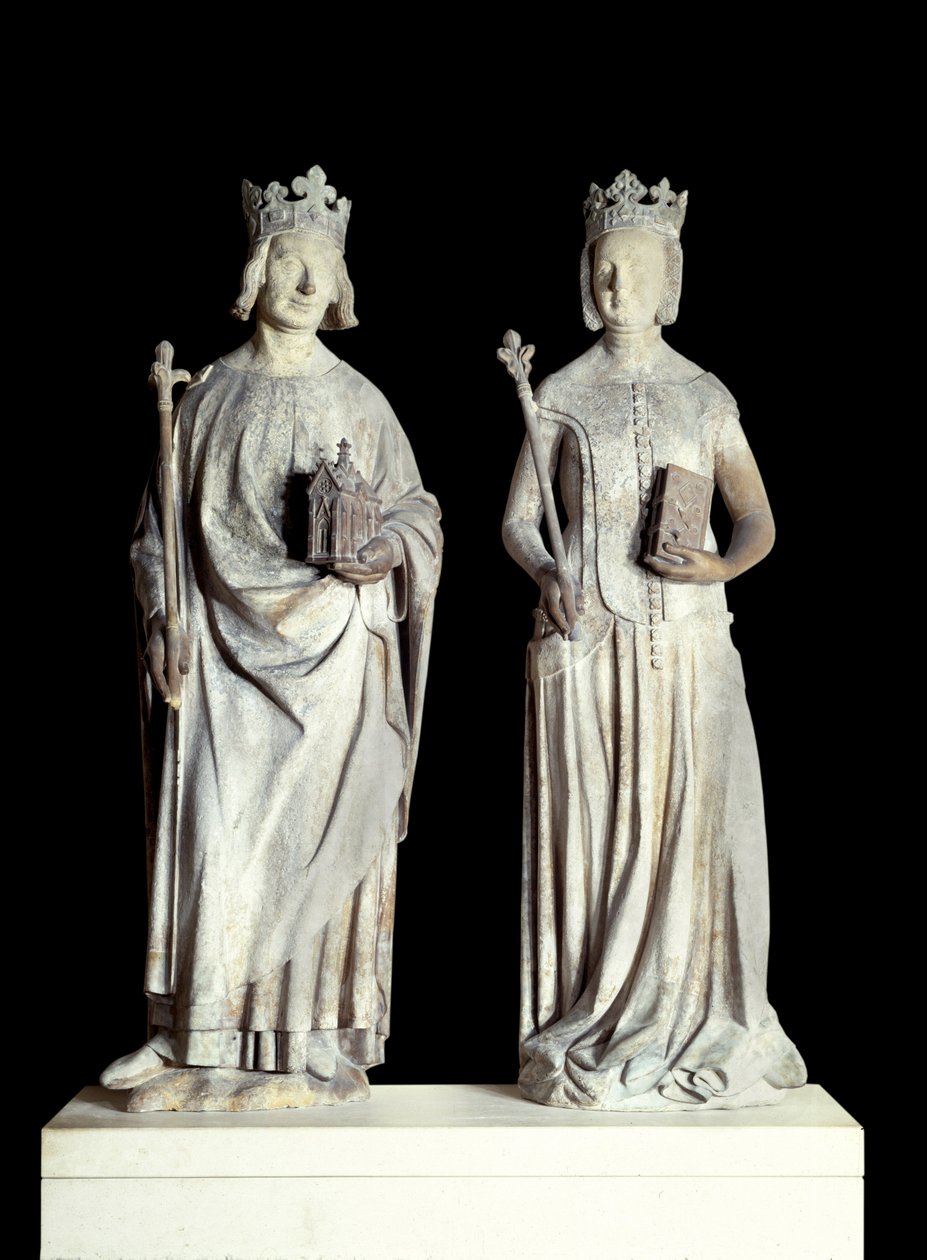 Art France: Statuer av kongen av Frankrike Charles V kjent som Karl den vise (1338-1380) og dronning av Frankrike Jeanne de Bourbon (1337-1378). Skulptur i kalkstein fra 1300-tallet. Sannsynligvis fra fasaden til den østlige inngangen til Louvre (dekor av French School