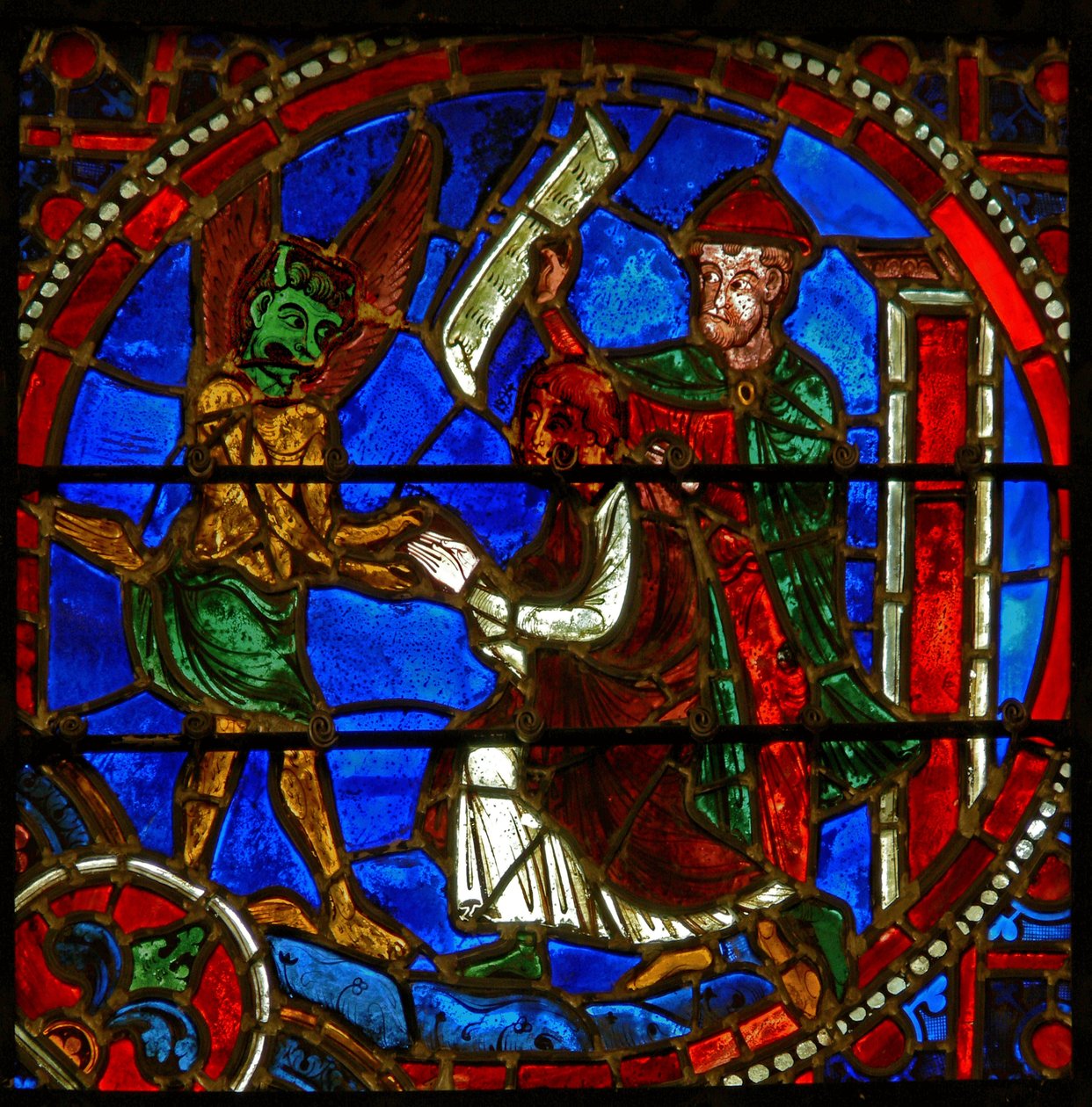 Detalj fra et vindu som viser scener fra miraklet til Theophilus av French School