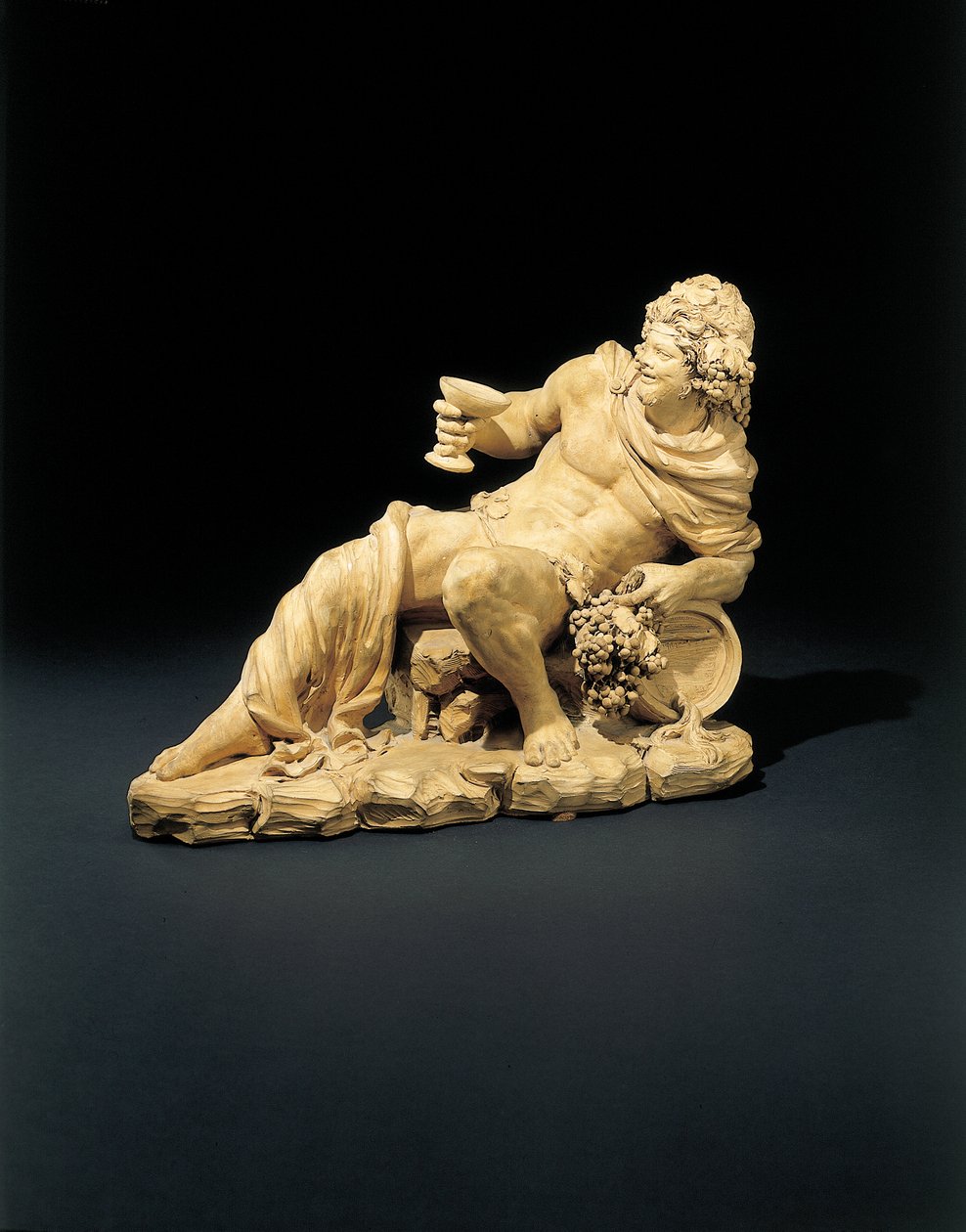 Figur av Bacchus liggende med et glass vin, ca. 1770 av French School