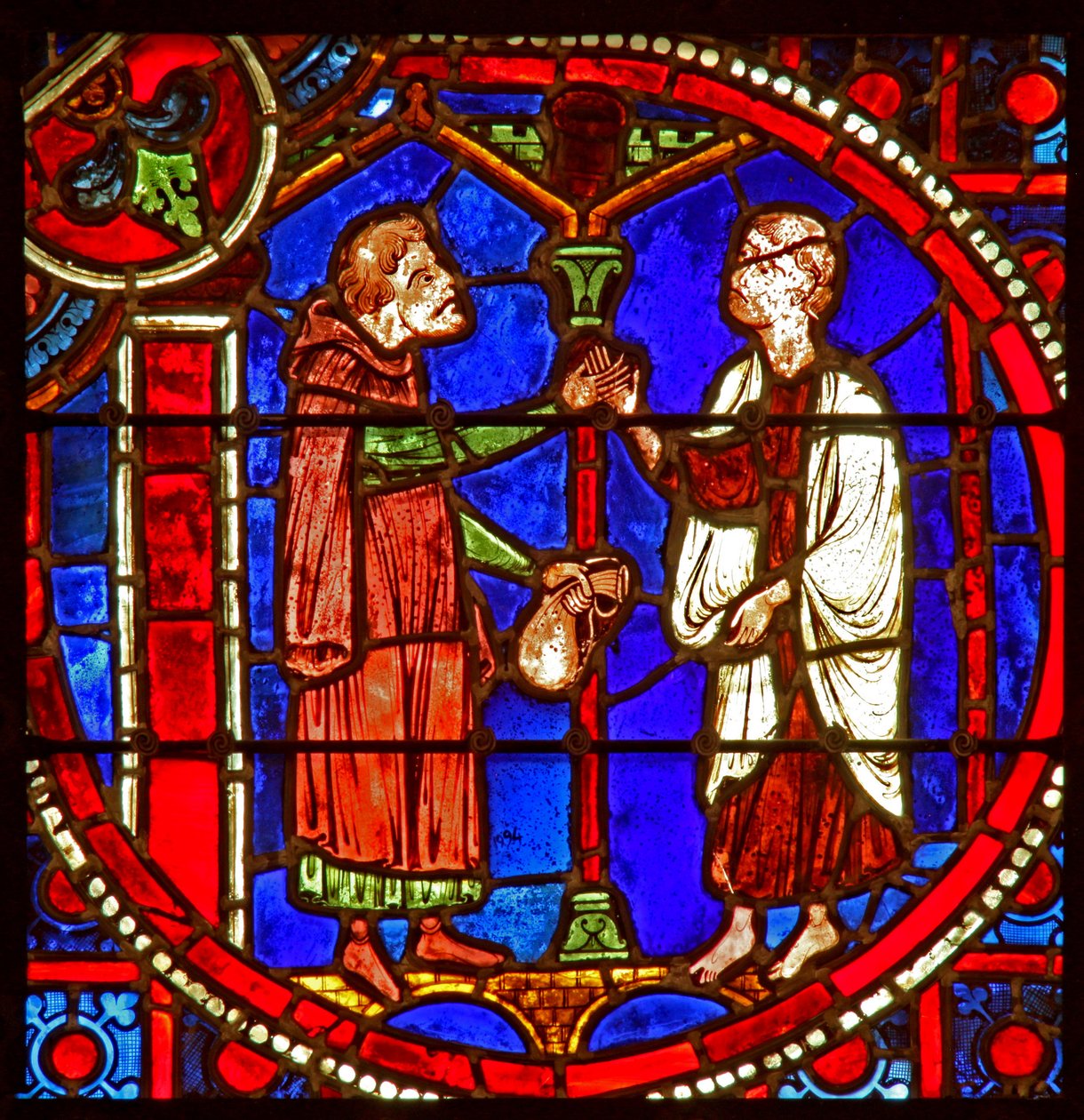 Vindu w1 som viser en scene fra Theophilus-historien: han ber om hjelp fra en tryllekunstner av French School
