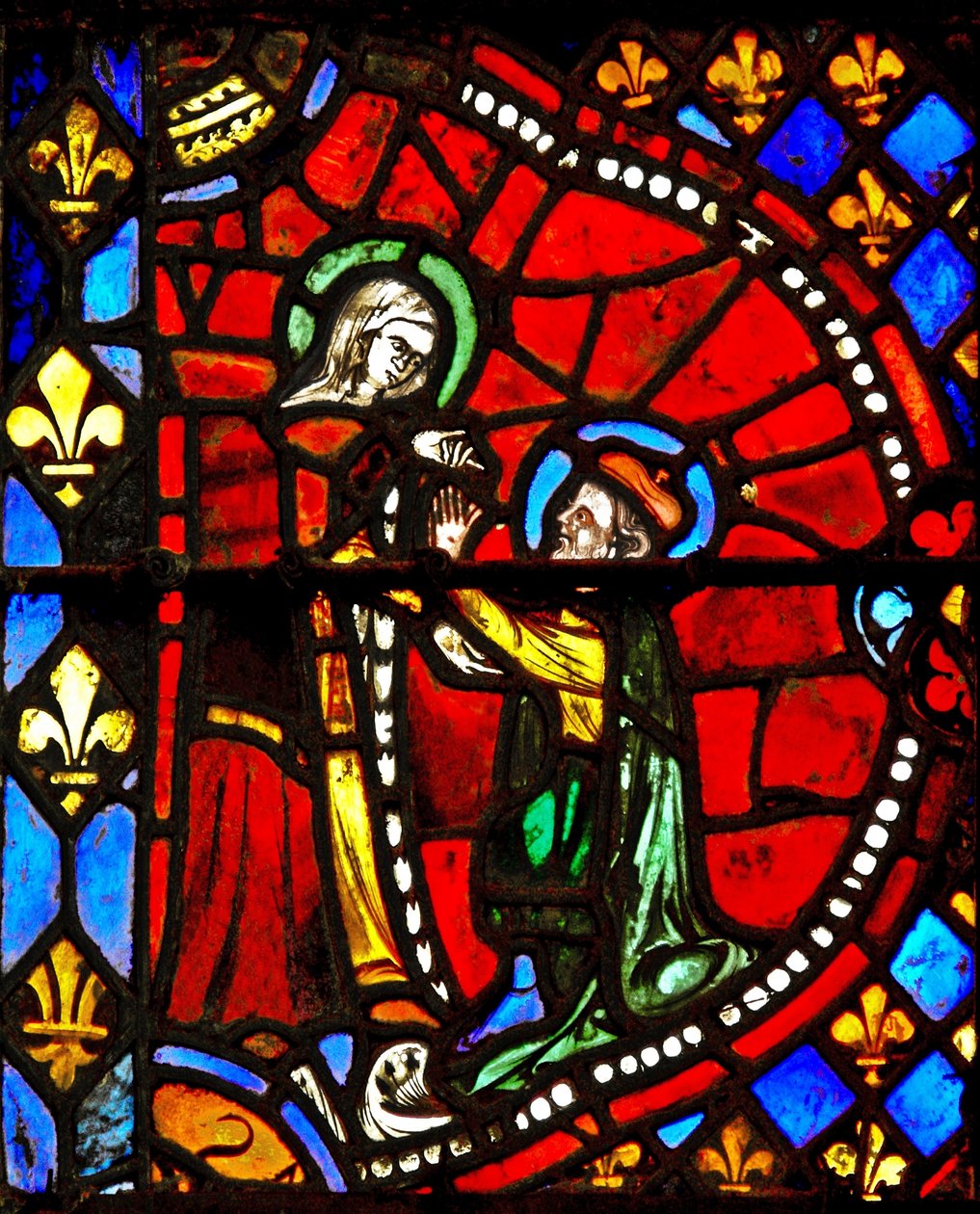 Vindu w6 som viser en scene fra Jomfru Marias liv: Josef ber Jomfru Maria om tilgivelse av French School