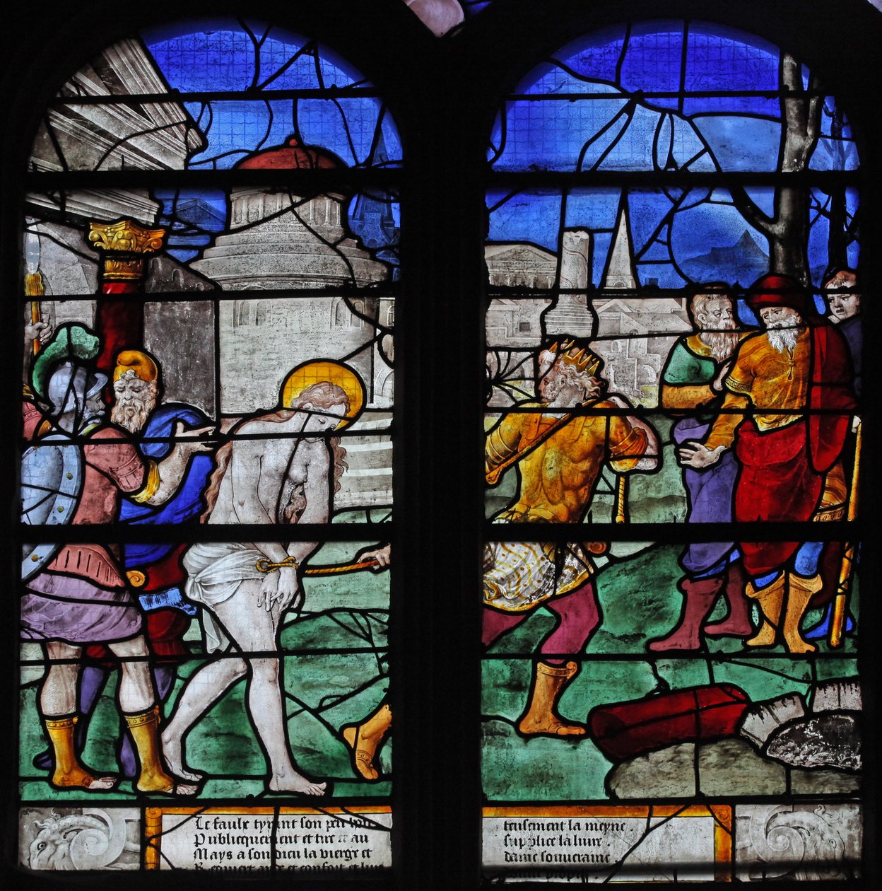 Vindu w7 som viser en scene fra St Barbaras liv av French School
