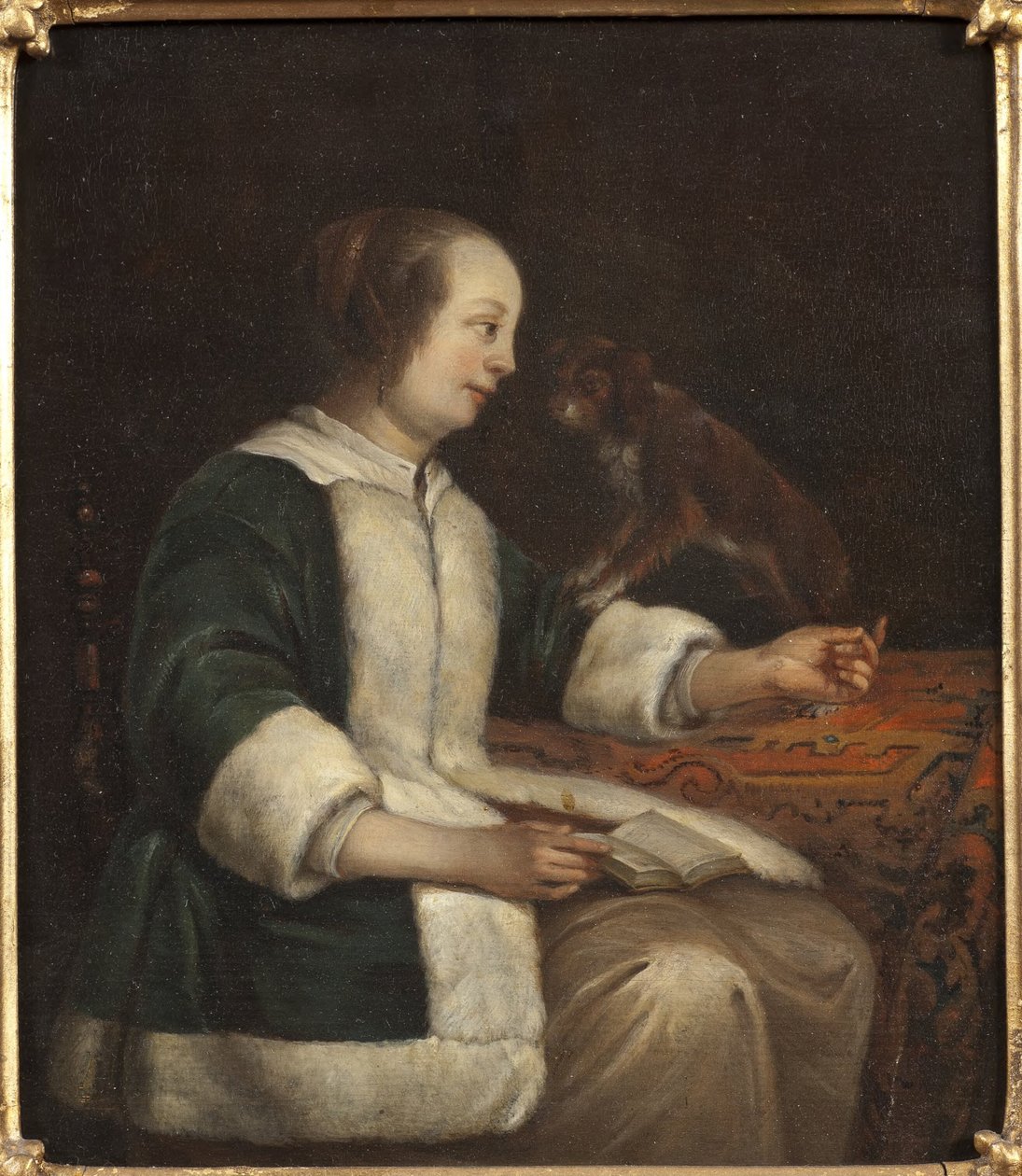 Portrett av en dame med en hund av Gabriel Metsu