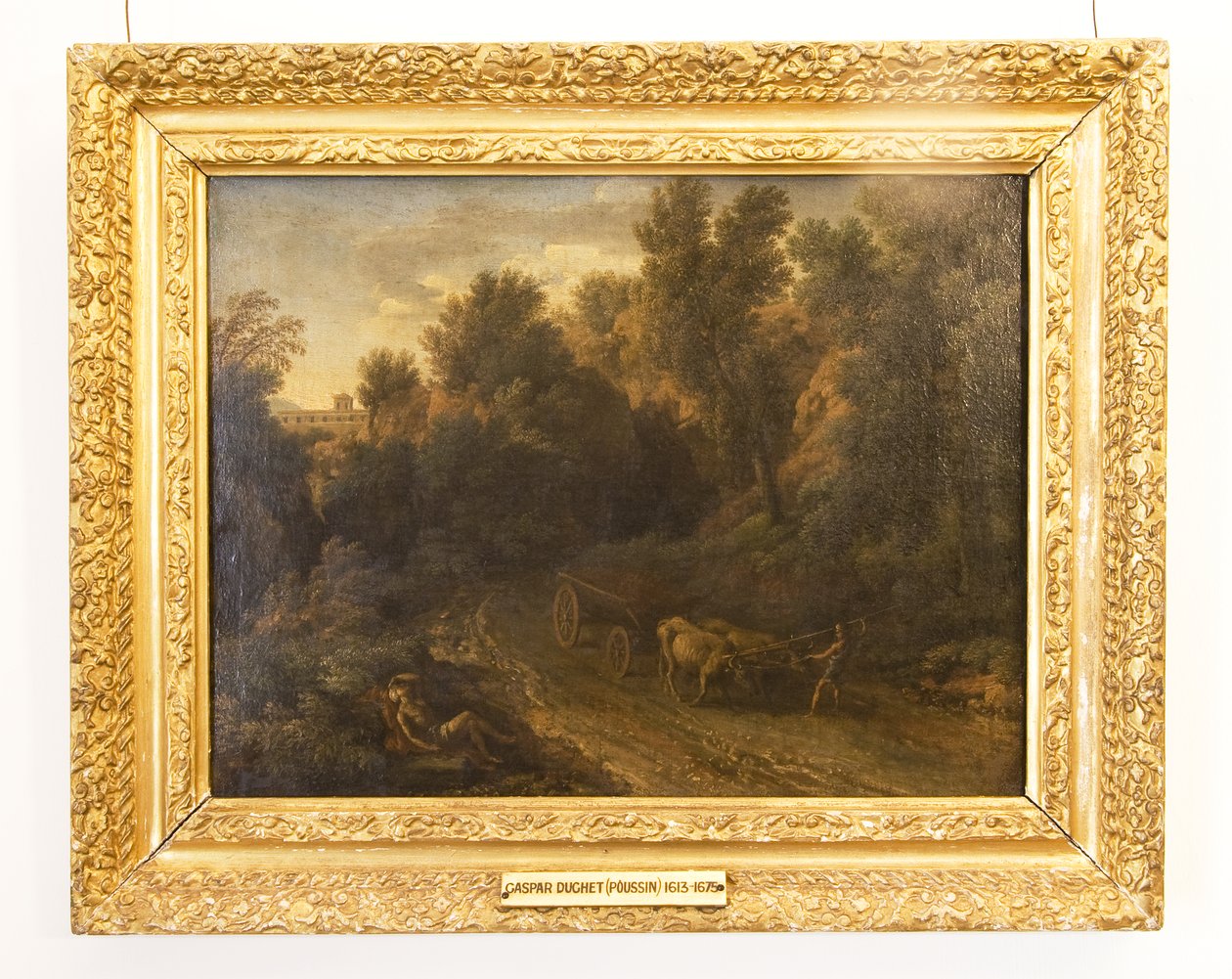 Et klassisk landskap med oksevogn og figurer av Gaspard Poussin Dughet
