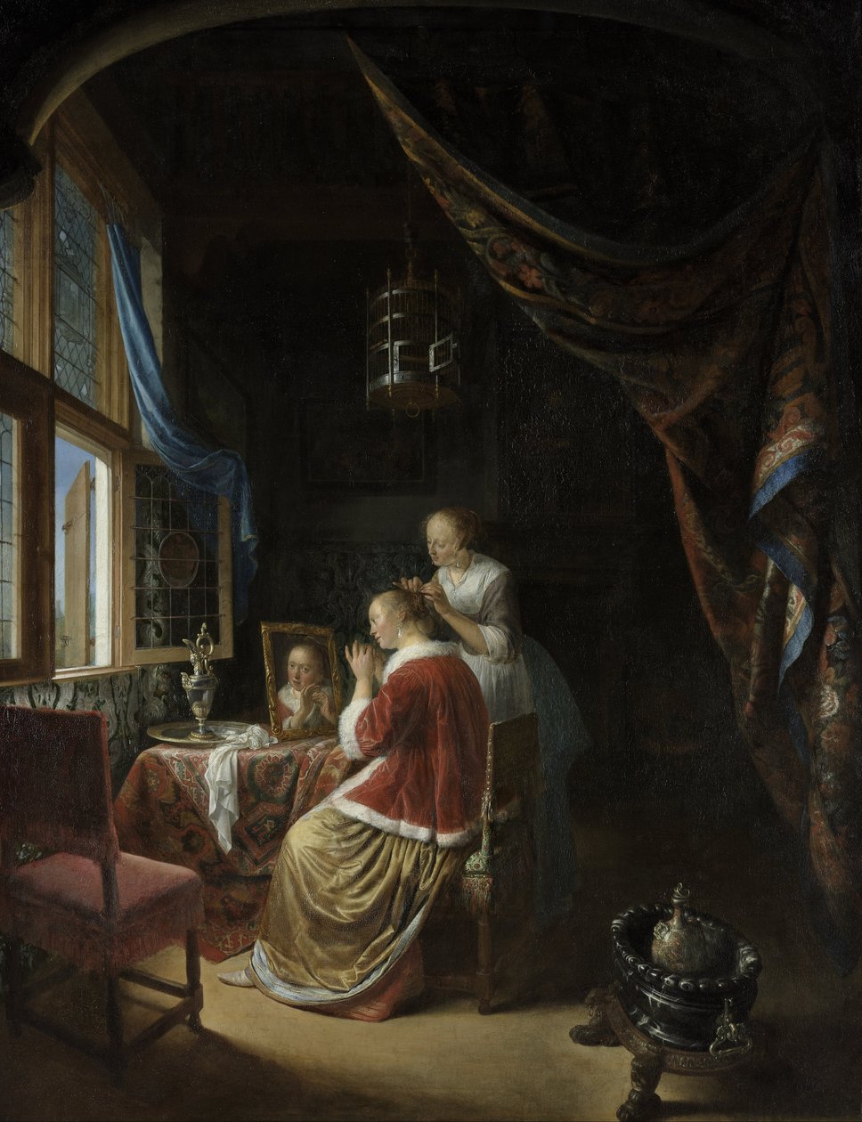 En ung kvinne på toalettet hennes av Gerrit Dou