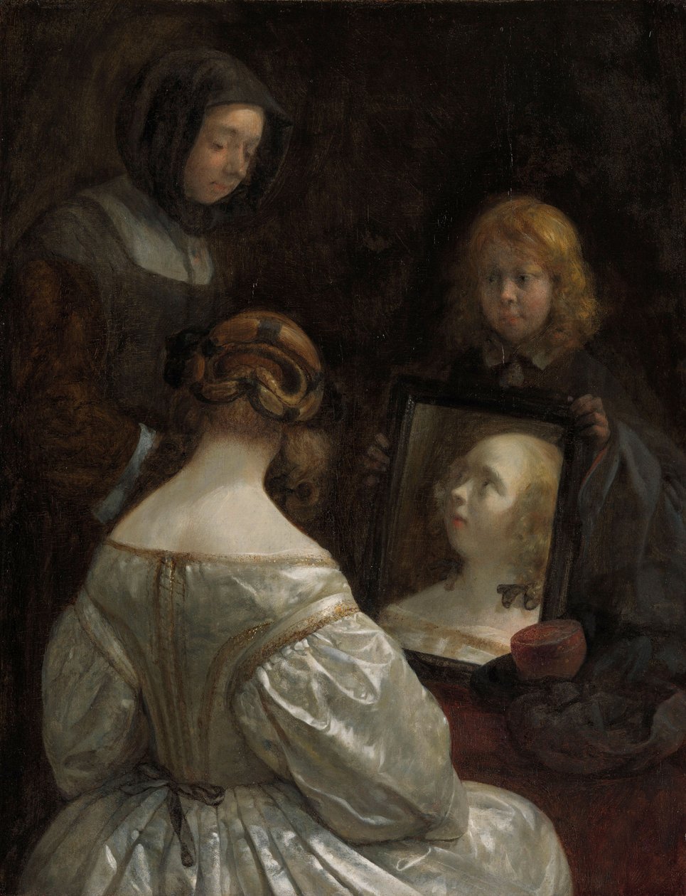 Kvinne ved et speil, ca. 1652 av Gerard ter Borch