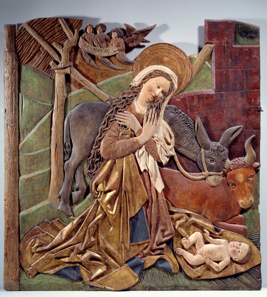 Nativittrelieff på innsiden av altertavlen i polykromt tre av den tyske skolen. 1510 Dim. 1,12x1,11 m Paris, Musée du Louvre av German School