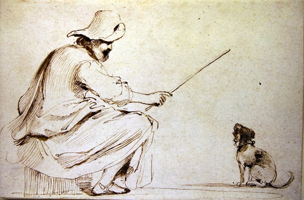 En sittende mann som trener en hund (penn og brunt blekk og vask på papir) av Guercino