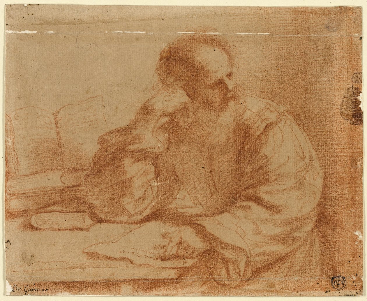 En skjeggete mann sitter ved bordet av Guercino