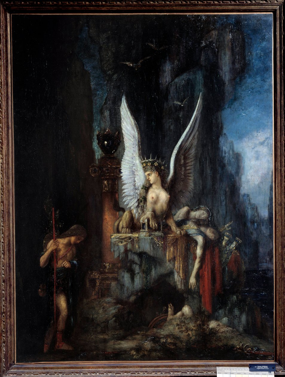 Den reisende eller ødipusreisende eller egalitten før døden Oedipus foran sfinksen. Maleri av Gustave Moreau (1826-1898) Søn fra 1800-tallet. 0,93x1,24 m Metz, musee des Beaux Arts. - Den reisende eller Ødipus den reisende eller likhet før døden, av Gustave Moreau