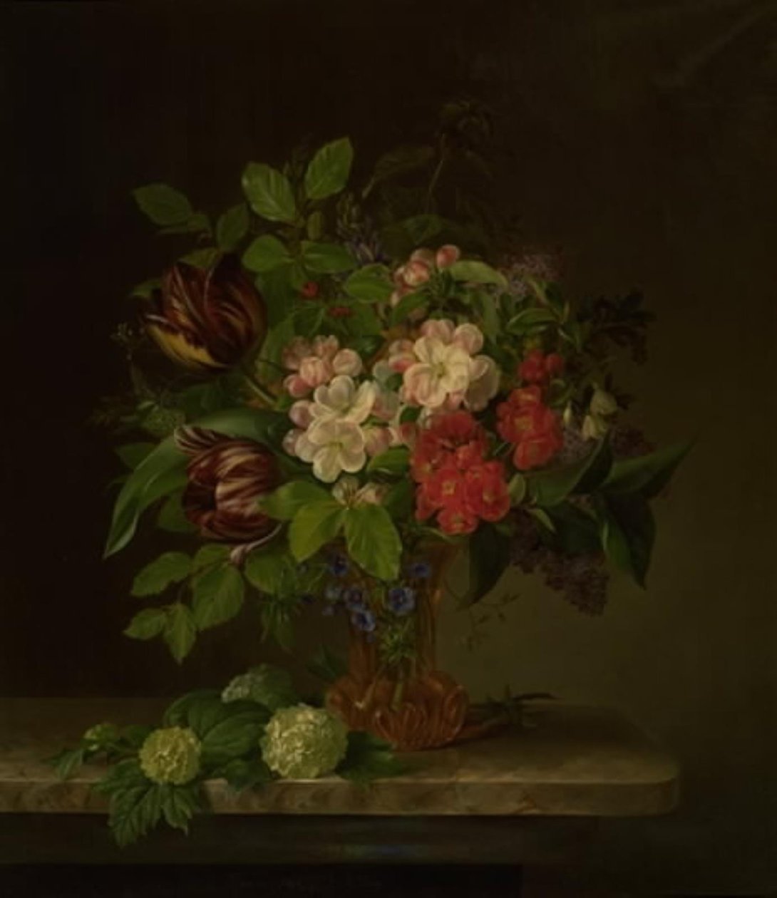 Et glass med vårblomster av Hanne Hellesen