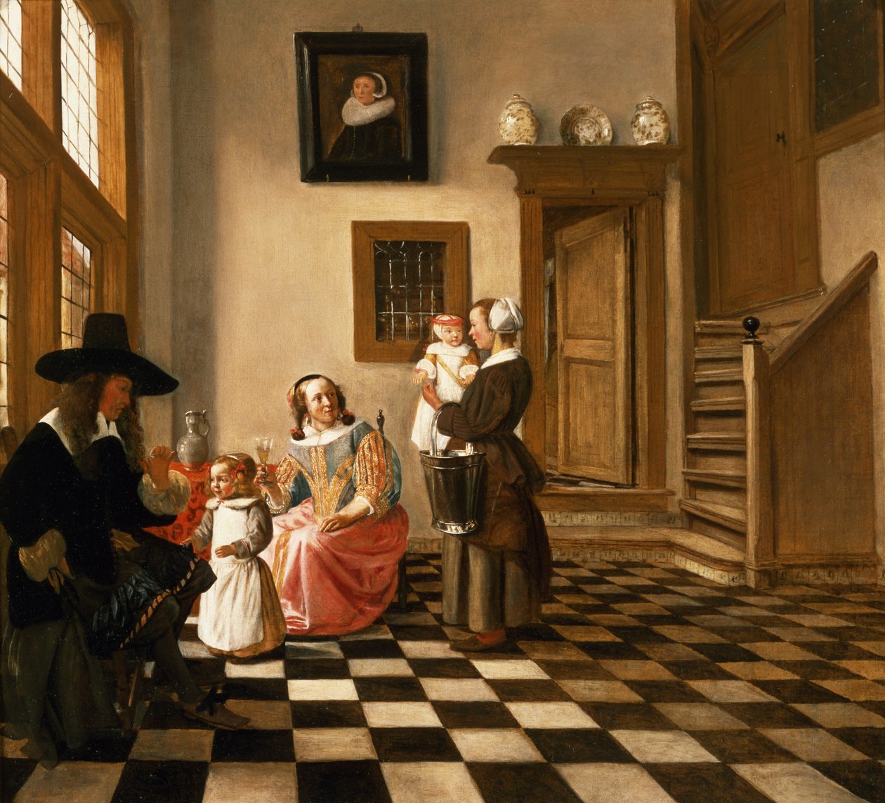 En familie i et interiør av Hendrik van der Burgh