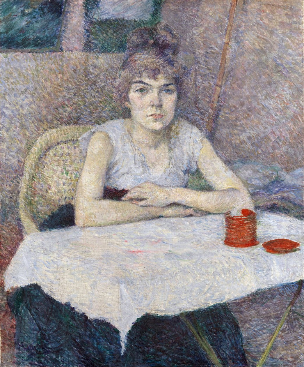 Ung kvinne ved et bord av Henri de Toulouse Lautrec