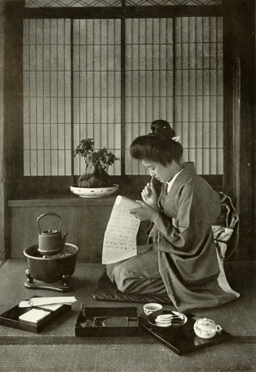 Skriver et brev, 1910. av Herbert Ponting