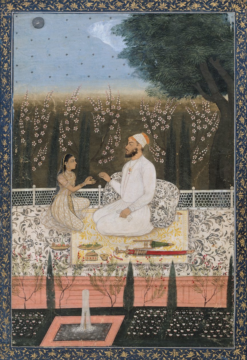 Par på en terrasse i en hage av Indian School