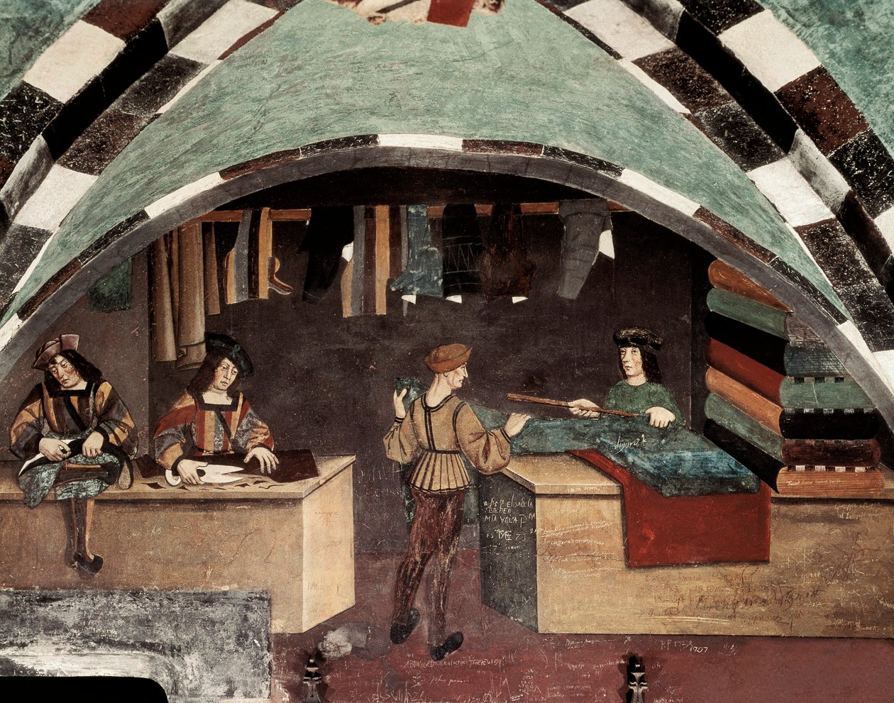 Skredderforretning. En mann syr, en annen klipper stoffet og en tredje selger tekstilet til en kunde. Fresco Castle Issogne (1400-tallet). av Italian School