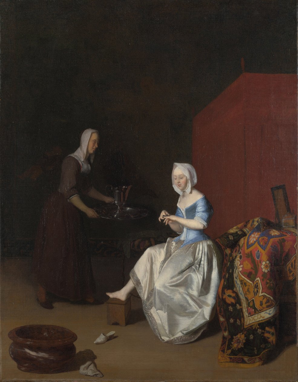 En ung dame som trimmer neglene hennes, deltatt av en tjenestepike, ca. 1670 av Jacob Lucasz. Ochtervelt