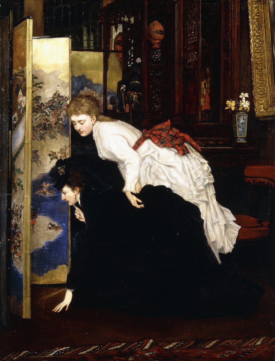 Unge kvinner ser på japanske gjenstander, ca. 1869-1870 av James Jacques Joseph Tissot