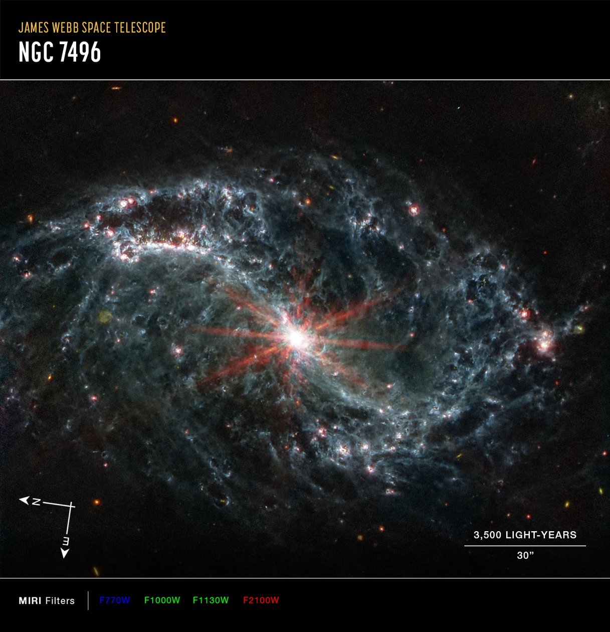NGC 7496 (MIRI kompassbilde) av James Webb Space Telescope (NASA)