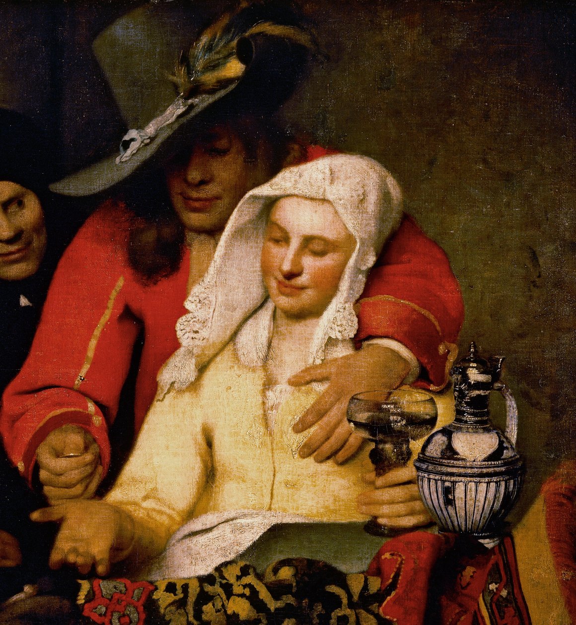 En mann holder frem en mynt til en kvinne som berører brystet hennes, detalj fra The Procuress av Johannes Vermeer