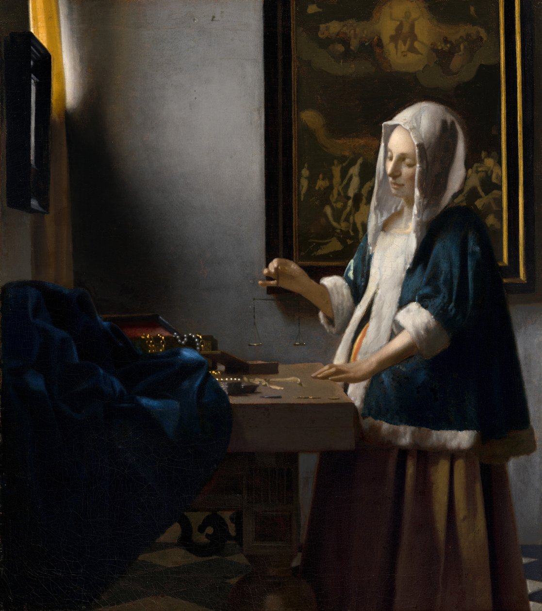 Kvinne som holder en balanse, ca. 1664. av Johannes Vermeer
