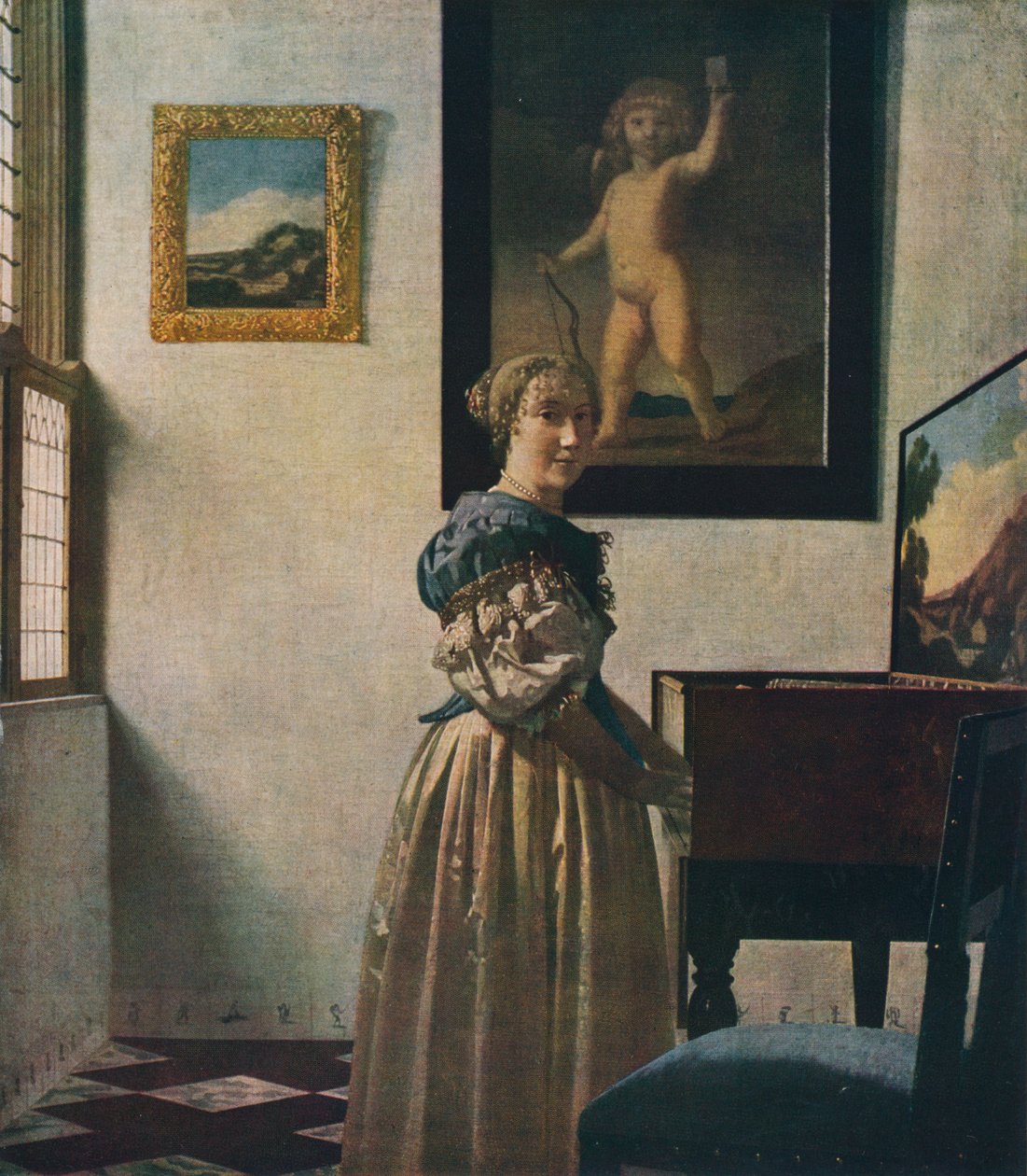 En ung kvinne som står ved en jomfru, ca 1670-1672 av Jan Vermeer van Delft